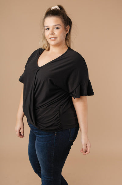 Nice Surprise Surplice Knit Top In Black