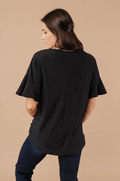 Nice Surprise Surplice Knit Top In Black