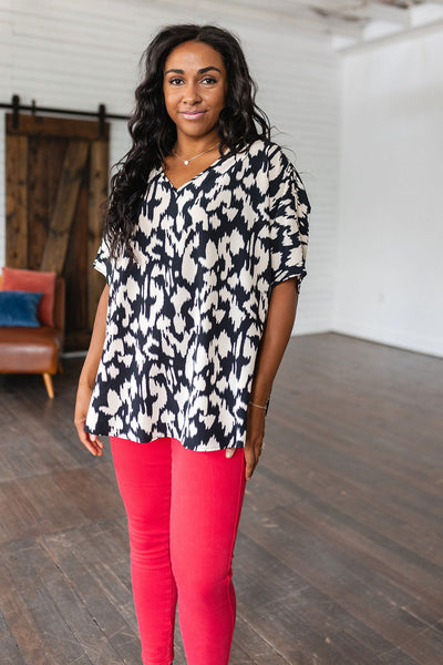 Unforgettable V-Neck Animal Print Blouse in Black